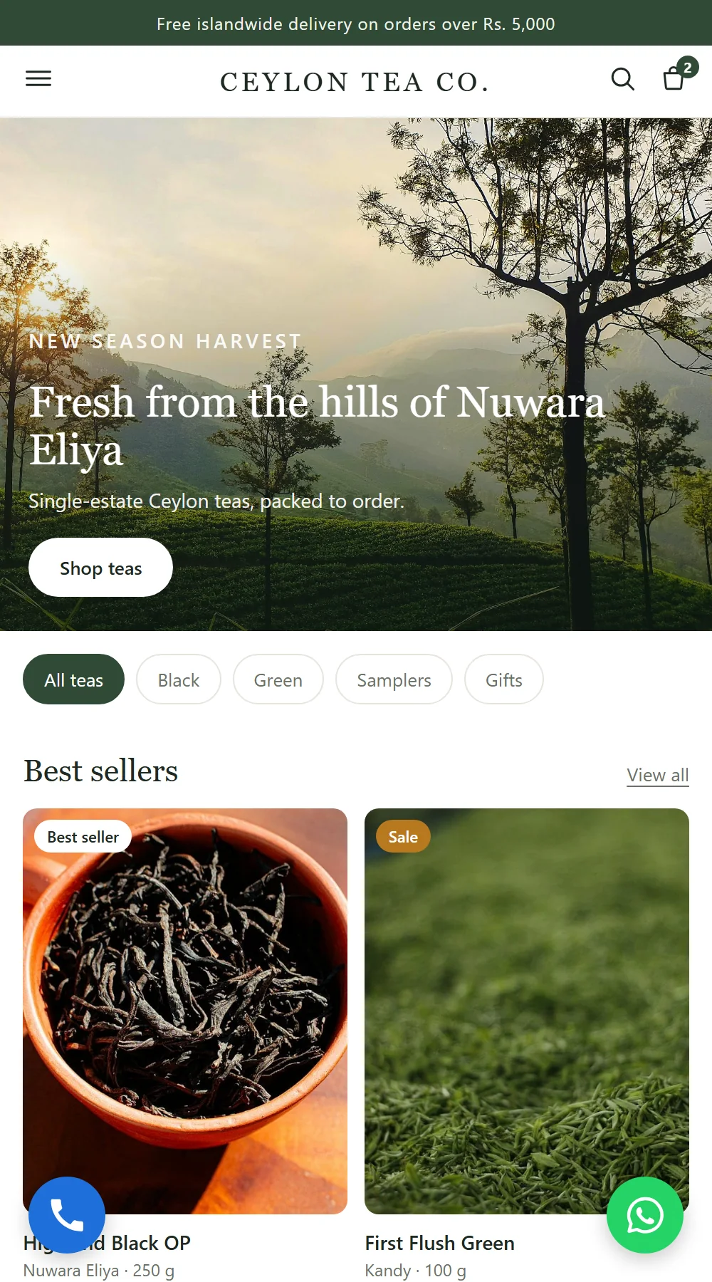 A tea store's home page on a phone with a blue call button in the bottom-left corner and a green WhatsApp button in the bottom-right corner.